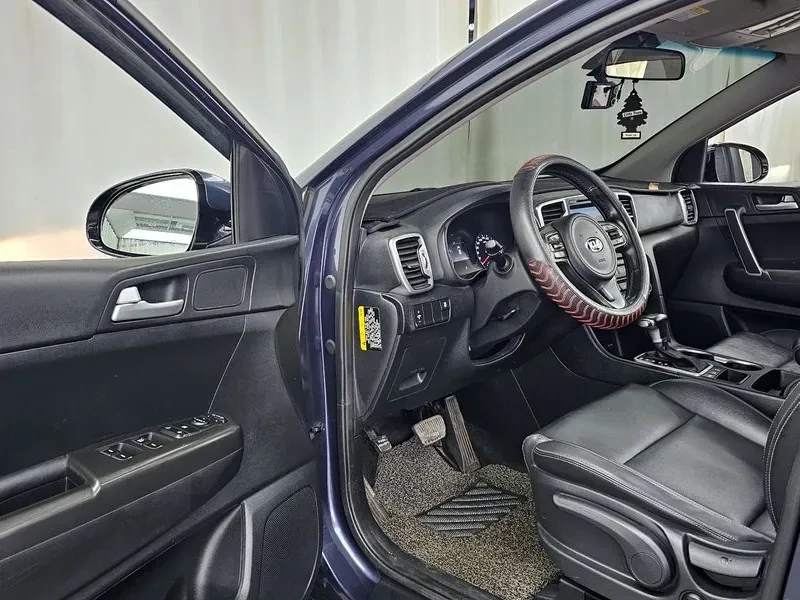 Kia Sportage 2.0 CRDi 4WD, снимка 10 - Автомобили и джипове - 54275123