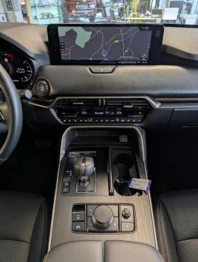 Обява за продажба на Mazda CX-80 3.3d* 6+ 1* PANO* HEAD-UP* 360CAM* DISTR* BOSE* ME ~56 160 EUR - изображение 10 | Auto.bg Обява за продажба на Mazda CX-80 3.3d* 6+ 1* PANO* HEAD-UP* 360CAM* DISTR* BOSE* ME ~56 160 EUR - изображение 10
