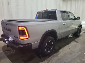 Dodge RAM 1500 REBEL | HEMI 5.7| PANO| NAVI| ВЪЗДУХ  - 23500 € / 45962.00 лв. - 46120994 3