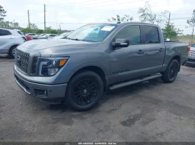 Nissan Titan crew cab 5.6l Titan Sv, снимка 2
