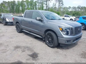 Nissan Titan crew cab 5.6l Titan Sv, снимка 1