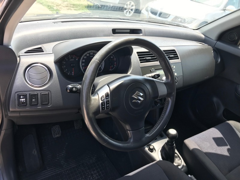 Suzuki Swift 1.3i-93кс.-бензин, снимка 12 - Автомобили и джипове - 46565528