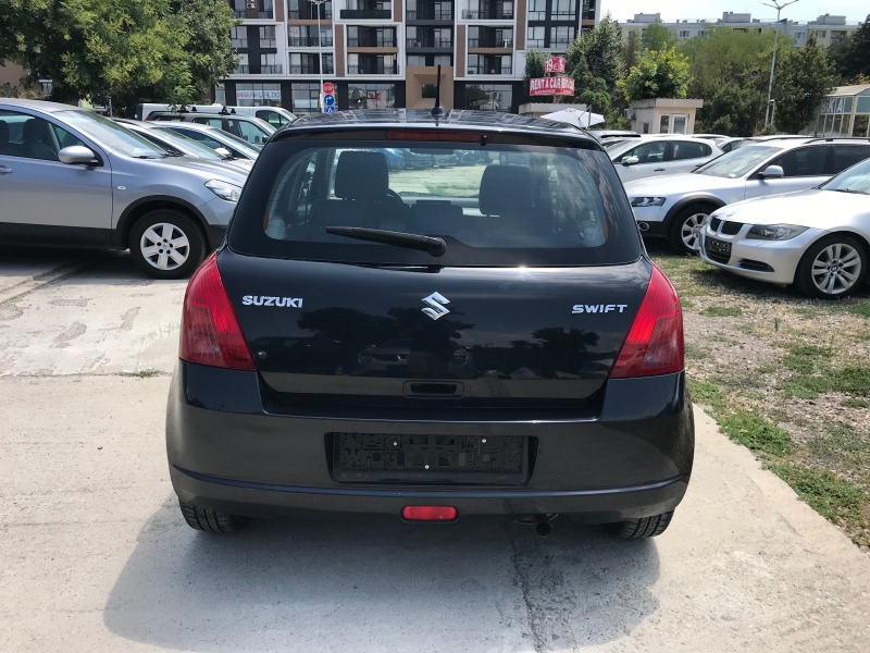 Suzuki Swift 1.3i-93кс.-бензин, снимка 4 - Автомобили и джипове - 46565528