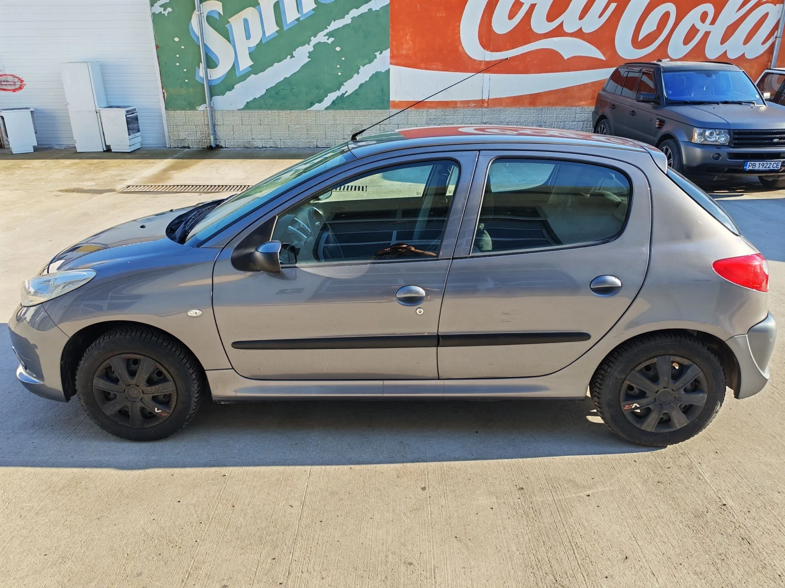 Peugeot 206 1.4 климатик, снимка 11 - Автомобили и джипове - 54740715