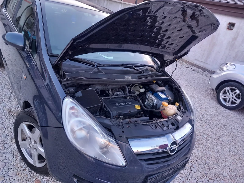 Opel Corsa 1.2i климатик, снимка 15 - Автомобили и джипове - 52540989