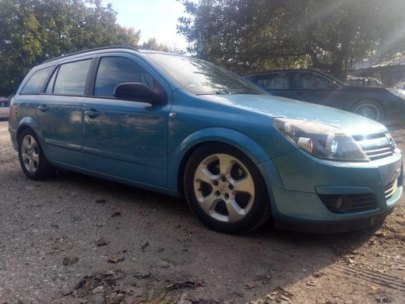 Opel Astra, снимка 14 - Автомобили и джипове - 47140049