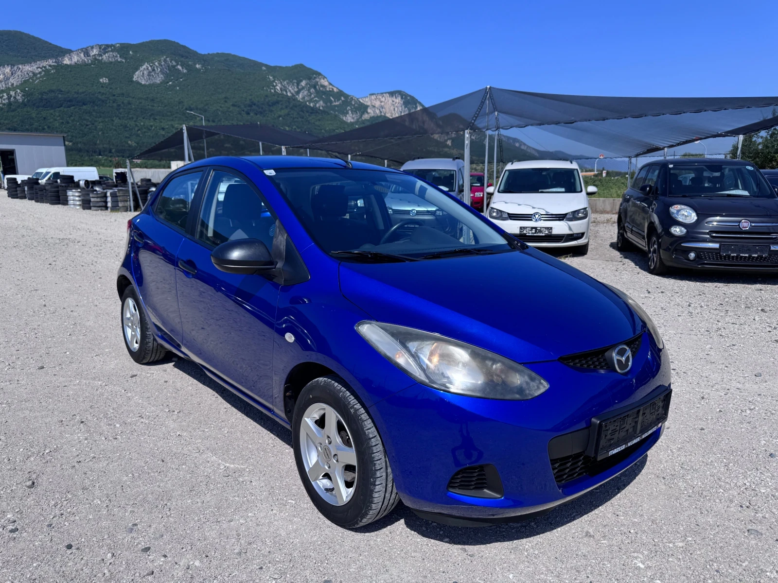 Mazda 2 1, 4 I 75 PS, снимка 8 - Автомобили и джипове - 55085435