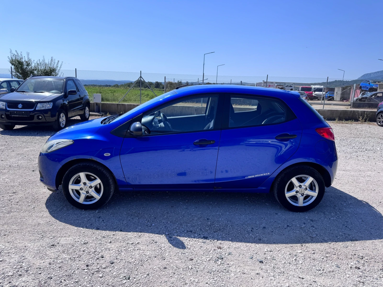 Mazda 2 1, 4 I 75 PS, снимка 3 - Автомобили и джипове - 55085435