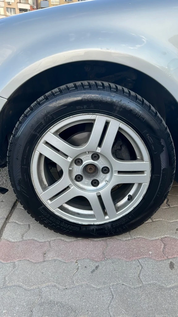 VW Passat 1.9 TDI, снимка 14 - Автомобили и джипове - 54626672
