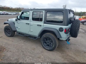 Jeep Wrangler 4XE 4X4 - 19480 € / 38099.57 лв. - 41455074 3