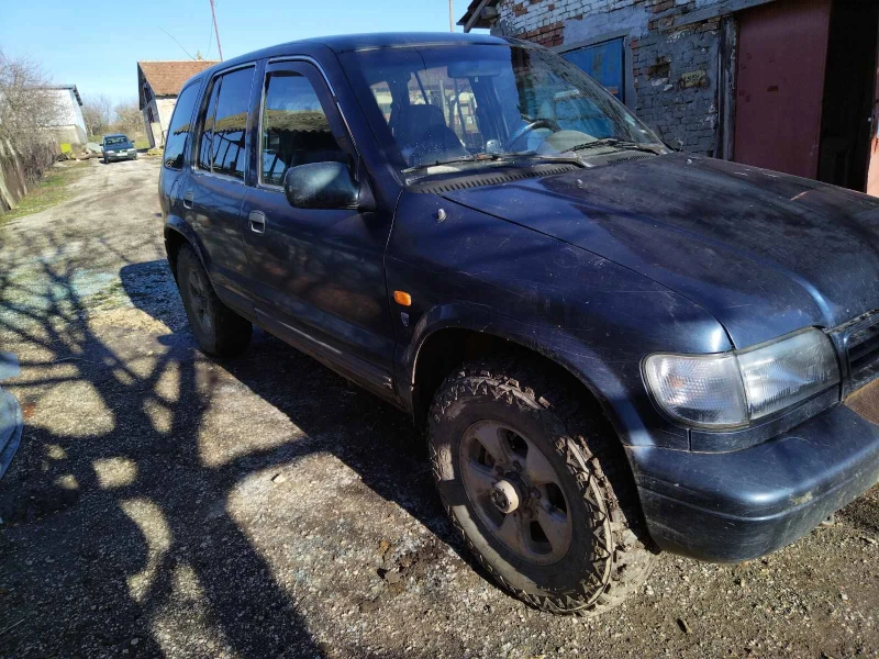 Kia Sportage, снимка 7 - Автомобили и джипове - 48510682