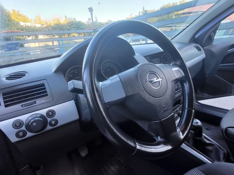 Opel Astra, снимка 11 - Автомобили и джипове - 47739602