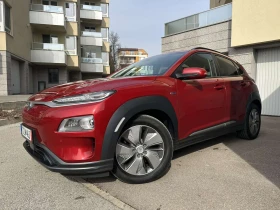 Hyundai Kona PREMIUM 64KWh FULL ASSIST/HEADUP/DISSTR/SOH98.6% - 34498 лв. - 76813773 | Car24.bg