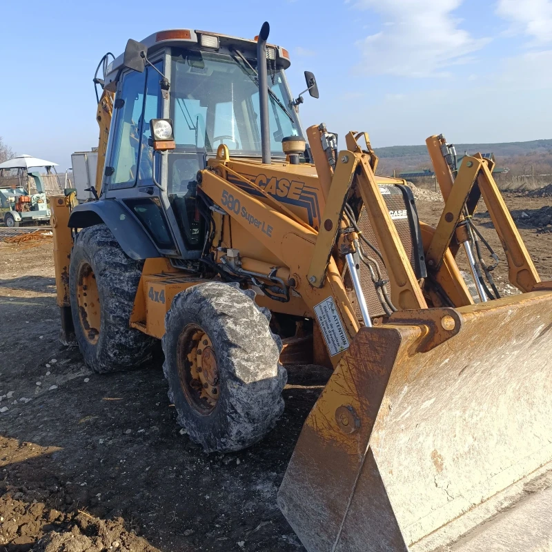 Багер Case 580SLE