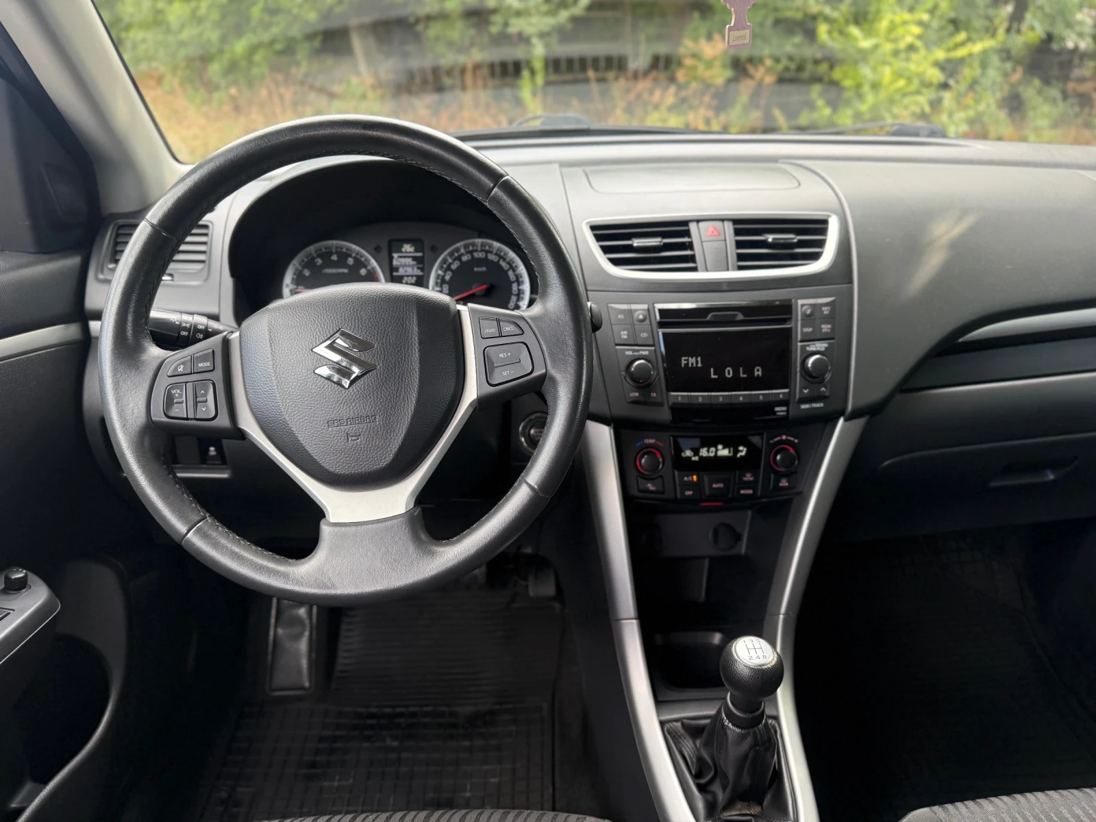 Suzuki Swift 1.2 I УНИКАТ 82 Хил.км., снимка 12 - Автомобили и джипове - 56110571