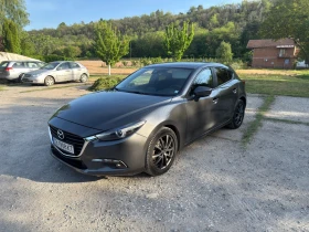������ Mazda 3