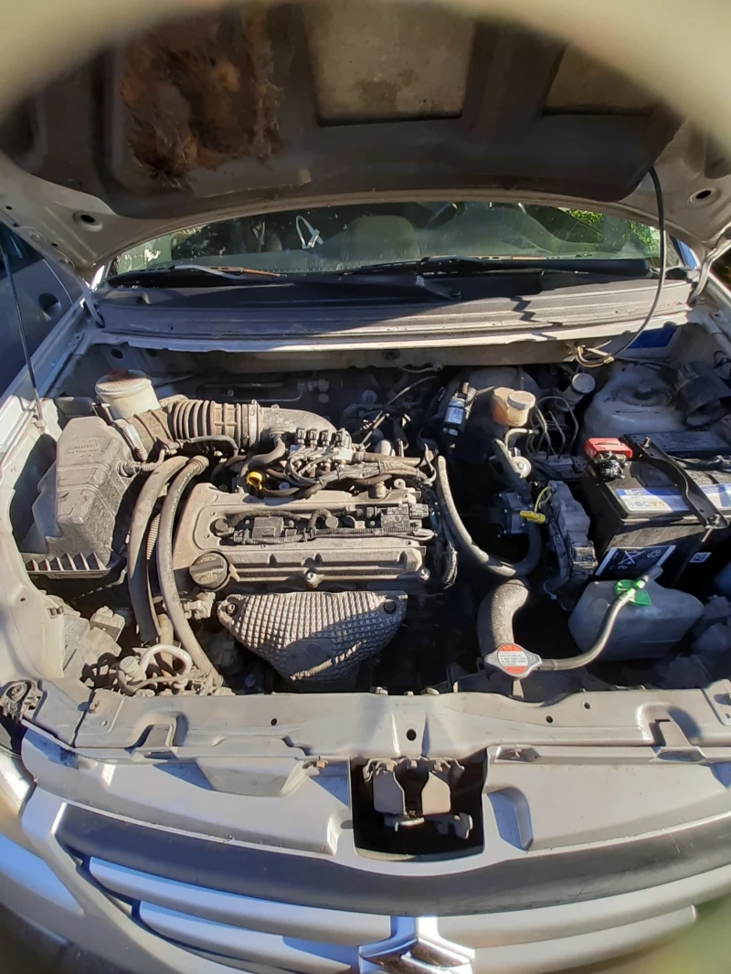 Suzuki Liana, снимка 13 - Автомобили и джипове - 52766009