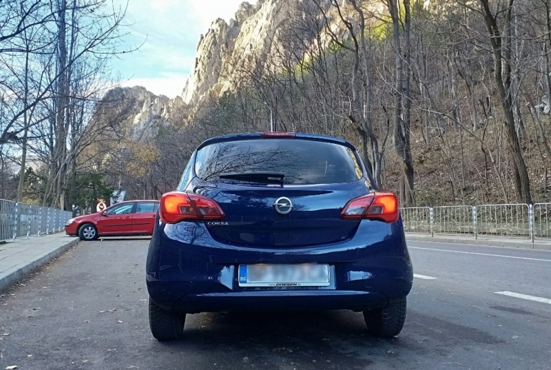 Opel Corsa Е, снимка 2 - Автомобили и джипове - 46441541