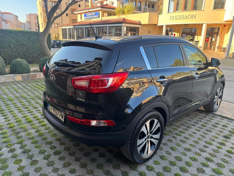Kia Sportage 2.0 CRDI, снимка 6 - Автомобили и джипове - 52799138
