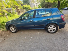������ Nissan Almera