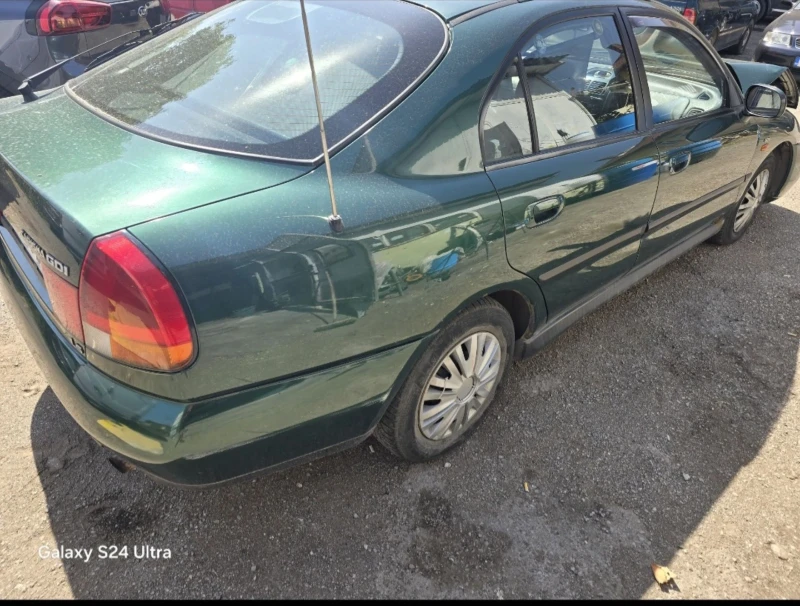 Mitsubishi Carisma 1.8GDI, снимка 3 - Автомобили и джипове - 47301890