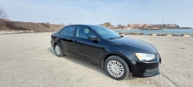 VW Jetta 2.0 115hp manual, снимка 13