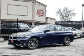 BMW 330 PLUG IN HYBRID | NAVI | CAM | ROOF | CLEAN CARFAX