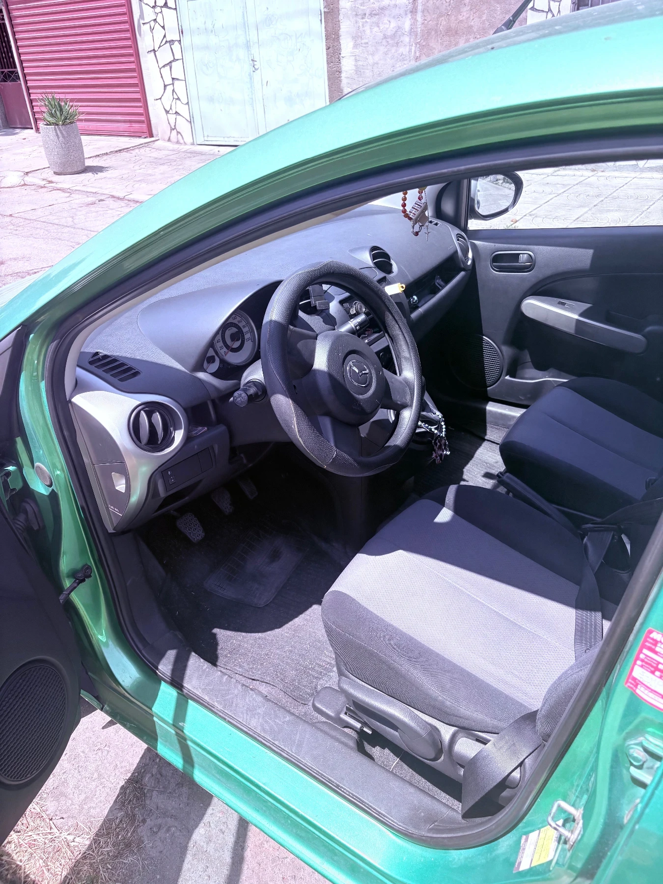 Mazda 2  - изображение 10