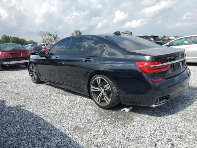 BMW 750 4.4L 8 Rear-wheel drive - изображение 10