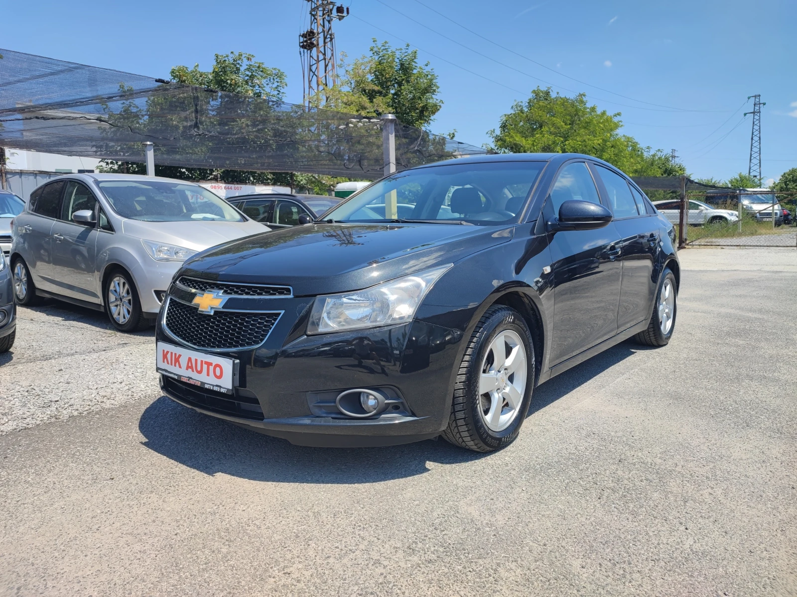 Chevrolet Cruze 1.8-142ks-ГАЗ-ПАРКТРОНИК, снимка 2 - Автомобили и джипове - 54849398