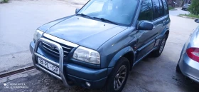     Suzuki Grand vitara 2.5/158 ..  