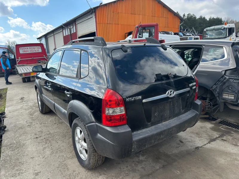 Hyundai Tucson 2.0 crdi 4WD, снимка 4 - Автомобили и джипове - 49817546