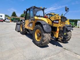 Телескопичен товарач Caterpillar ТН330В, снимка 3