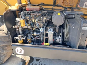 Телескопичен товарач Caterpillar ТН330В, снимка 8