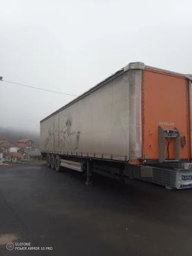 Полуремарке Schwarzmuller HANGLER Тунел за рулони