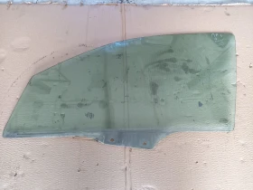 Стъкло предно ляво Мазда 2 1.4д 