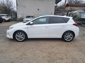 Toyota Auris 1.8 HYBRID* КЛИМА* NAVI* КАМЕРА* ТЕМПОМАТ - 10690 € / 20907.82 лв. - 26850325 3