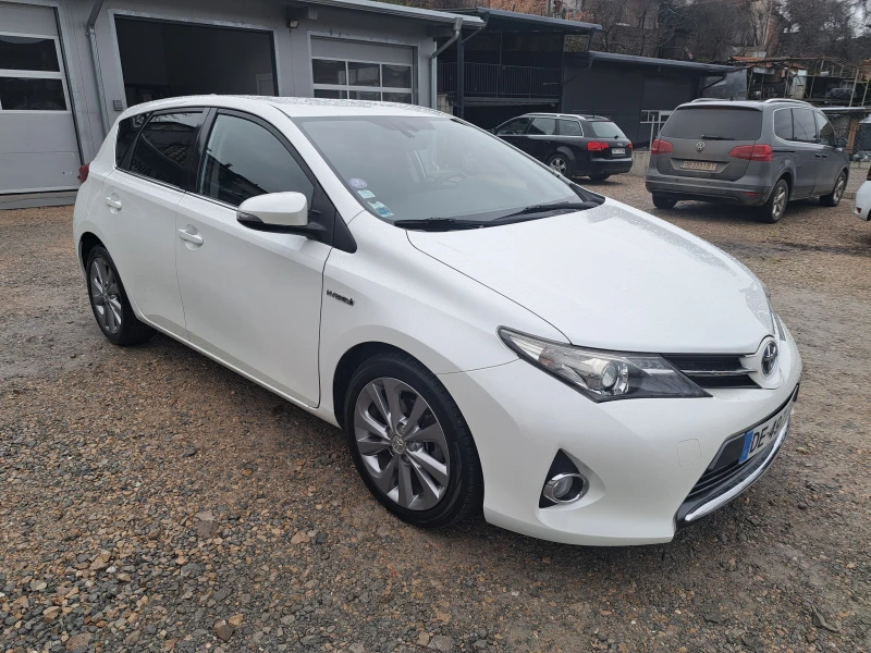 Toyota Auris 1.8 HYBRID* КЛИМА* NAVI* КАМЕРА* ТЕМПОМАТ, снимка 4 - Автомобили и джипове - 53283277