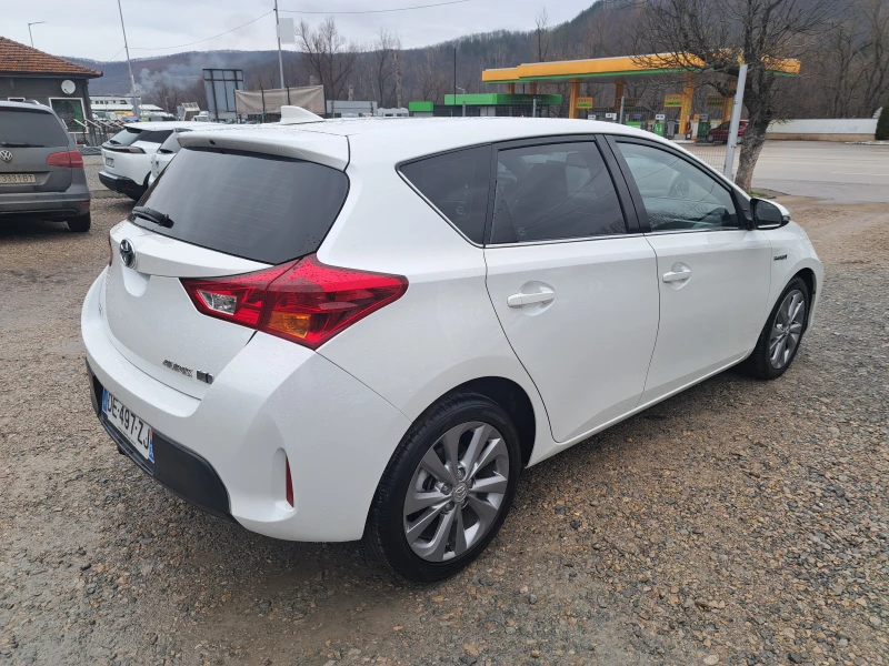 Toyota Auris 1.8 HYBRID* КЛИМА* NAVI* КАМЕРА* ТЕМПОМАТ, снимка 2 - Автомобили и джипове - 53283277