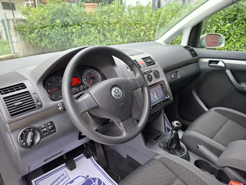 VW Touran 1.9TDI-105к.с.* ПЕРФЕКТНА* НАВИ* 6 ск.* ТОП* , снимка 11 - Автомобили и джипове - 52533007