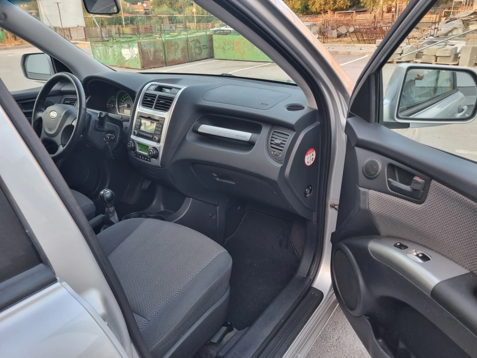 Kia Sportage 2.0i 4x4 GPL, снимка 13 - Автомобили и джипове - 55770286