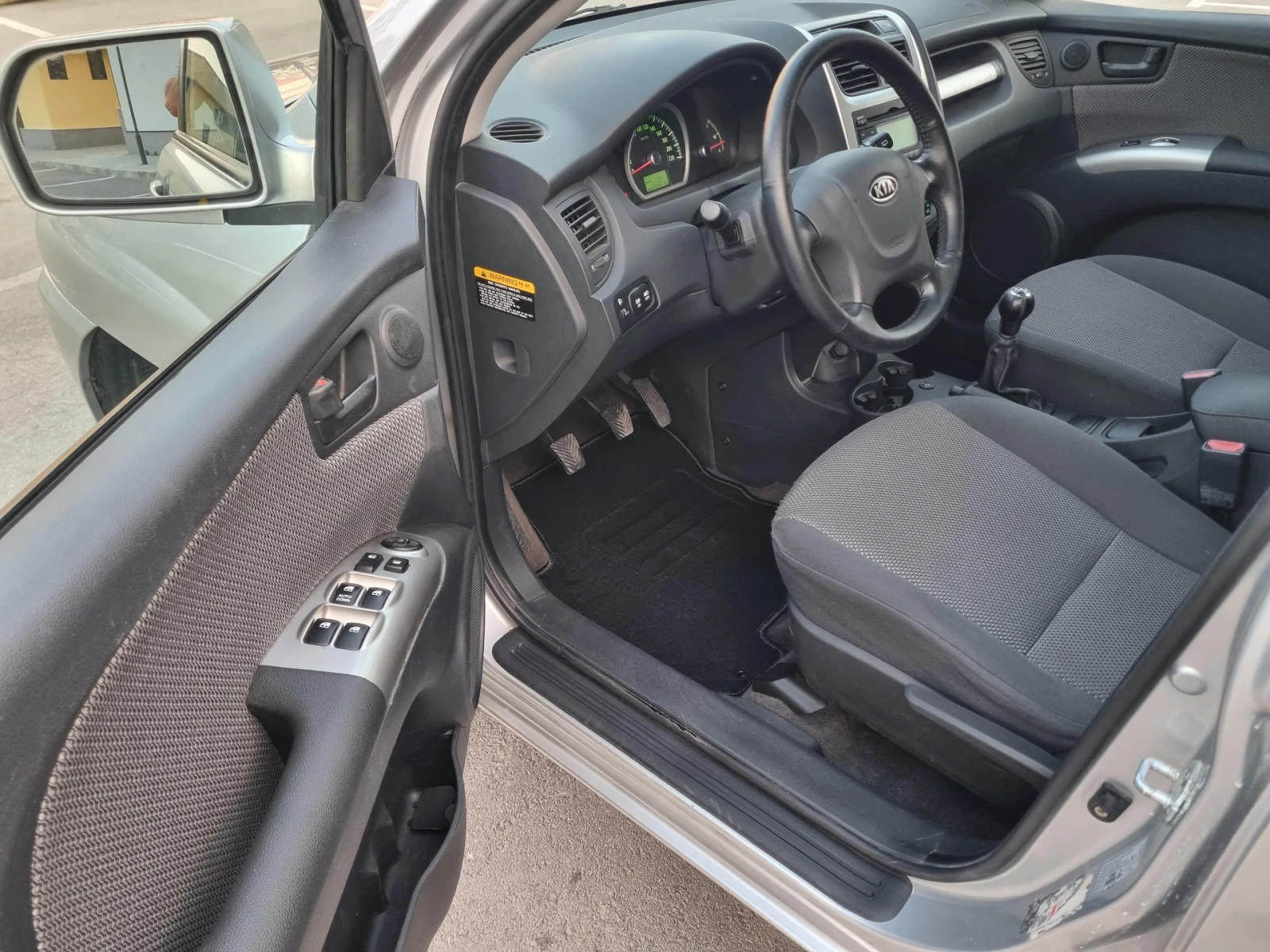 Kia Sportage 2.0i 4x4 GPL, снимка 10 - Автомобили и джипове - 55770286
