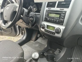 Kia Sportage 2.0 CRDi 4WD Klimatronik 120 k.c., снимка 11