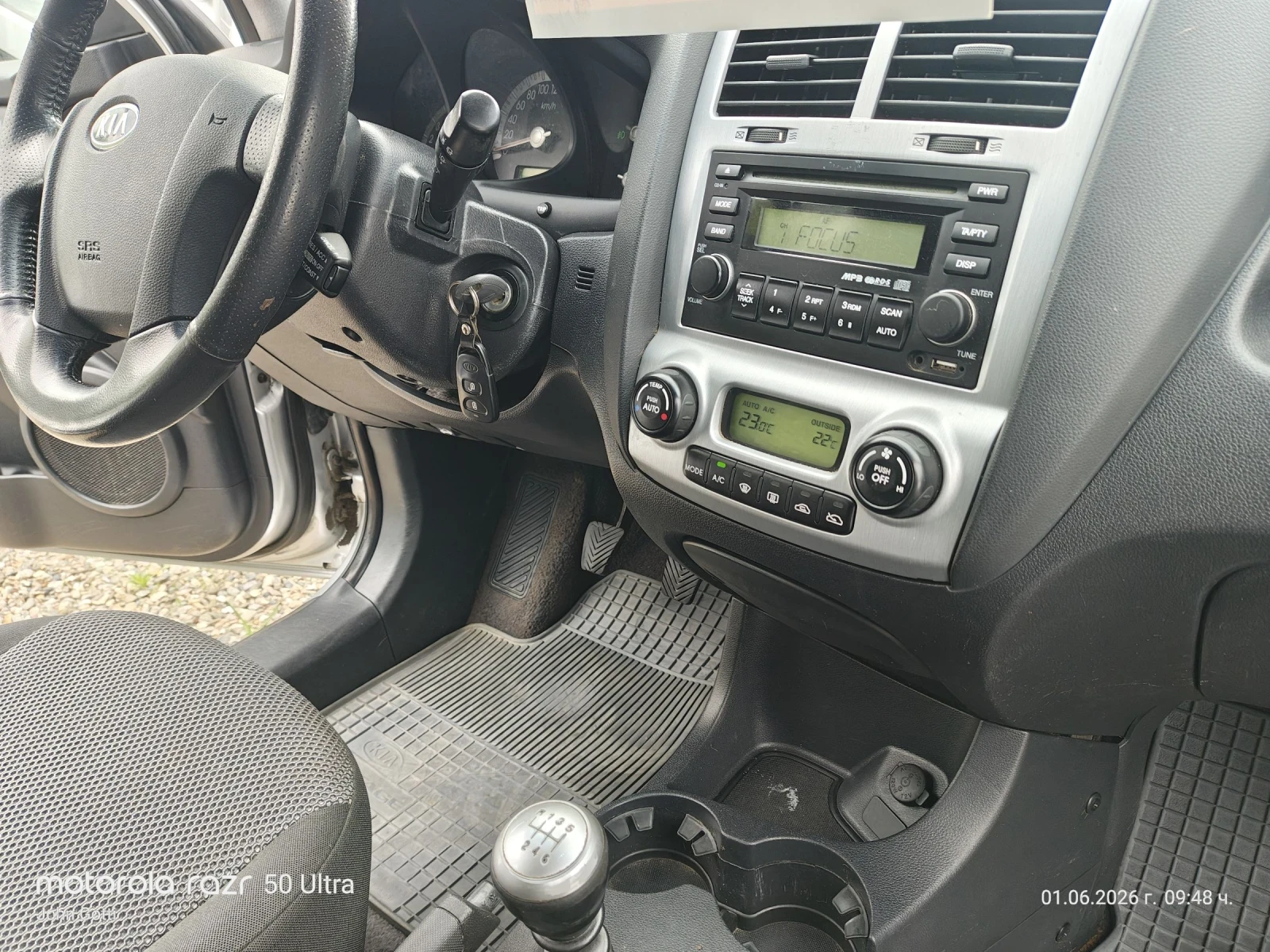 Kia Sportage 2.0 CRDi 4WD Klimatronik 120 k.c., снимка 11 - Автомобили и джипове - 53814128
