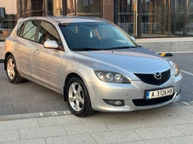 ������ Mazda 3