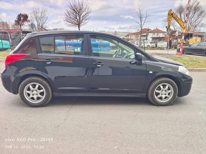 Nissan Tiida 1.6i 16V Swiss Aut., снимка 17 - Автомобили и джипове - 43378448