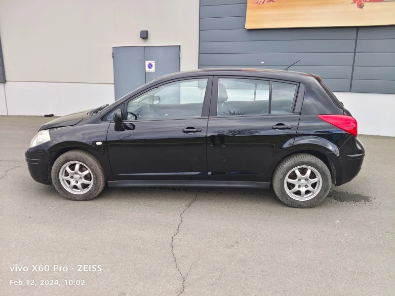 Nissan Tiida 1.6i 16V Swiss Aut., снимка 16 - Автомобили и джипове - 43378448