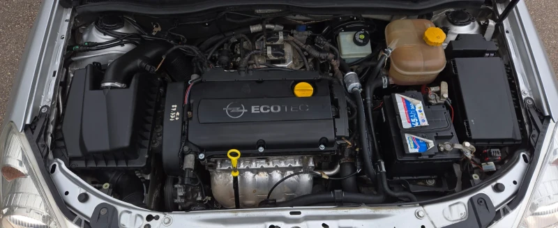 Opel Astra, снимка 14 - Автомобили и джипове - 52582684