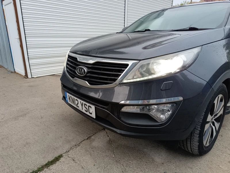 Kia Sportage 2.0 CRDI AWD , снимка 4 - Автомобили и джипове - 51856245