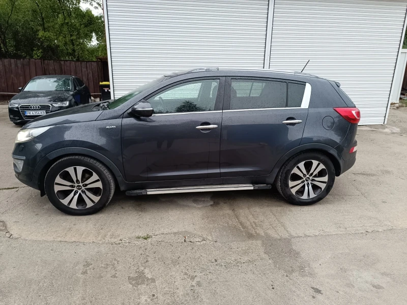 Kia Sportage 2.0 CRDI AWD , снимка 5 - Автомобили и джипове - 51856245